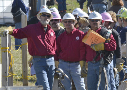 Midwest Energy Journeyman Senior Division team members Mike Stremel, Operations Training Manager at Hays; Bill Nowlin, Line Foreman at WaKeeney, and John Horesky, Line Foreman at Russell, gather before competing at the 31st International Lineman’s Rodeo in Bonner Springs, Oct. 18. The team would take 1st place in the competition, with the only perfect score among 24 senior teams from some of the country’s largest utilities.
