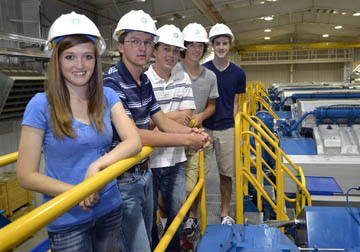 (From left) Rebecca Bange of Rexford joins Cheylin High School student Jacob Brubaker of Bird City, Seth Hachmeister of Natoma, Ross Frame of Kinsley and Matt Mindrup of Hays, in touring Midwest Energy’s Goodman Energy Center in Hays on June 12.  The group joined other students from Kansas to represent the state at the 2014 Youth Tour in Washington, D.C.