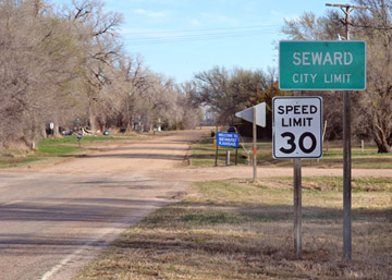 Friendly signs welcome visitors to the city of Seward, located roughly 18 miles south of Great Bend in Stafford County.  Voters in Seward opted to sell their electric system to Midwest Energy in a vote that was certified on Mar. 25.  